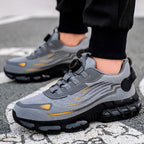 Arenzza non-slip safety shoes with shock-absorbing studs, designed for durable footwear and safety in work environments.