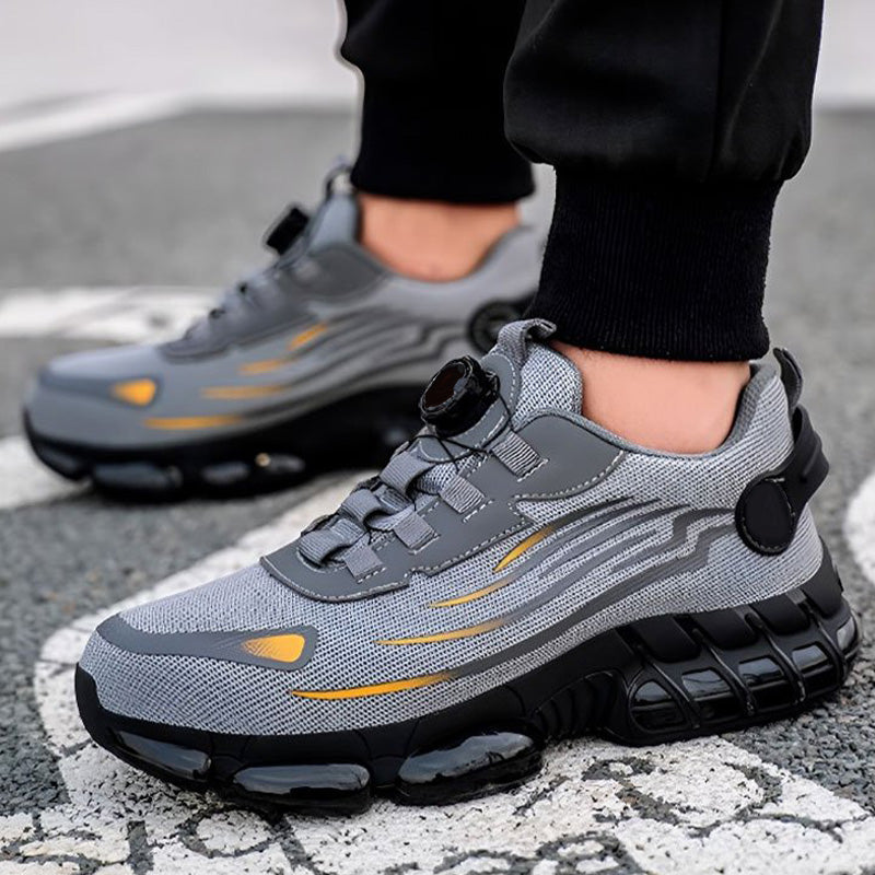 Arenzza non-slip safety shoes with shock-absorbing studs, designed for durable footwear and safety in work environments.