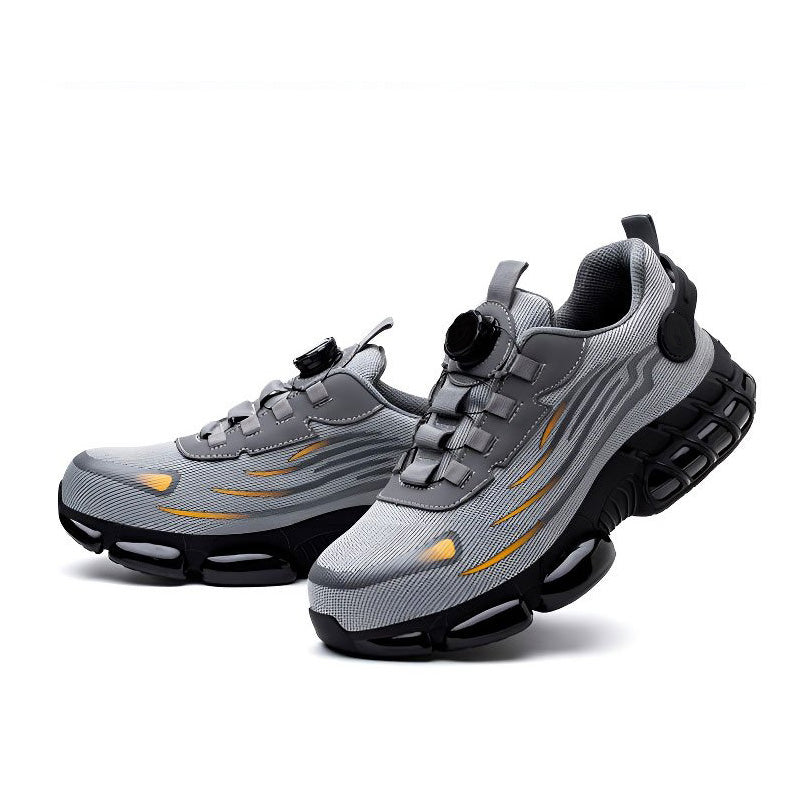 A pair of Arenzza non-slip safety shoes with shock-absorbing studs, designed for workplace safety and comfort.