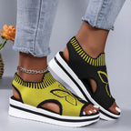 A pair of women's casual peep-toe platform beach sandals by Arenzza, featuring neutral-colored straps and a chunky sole.