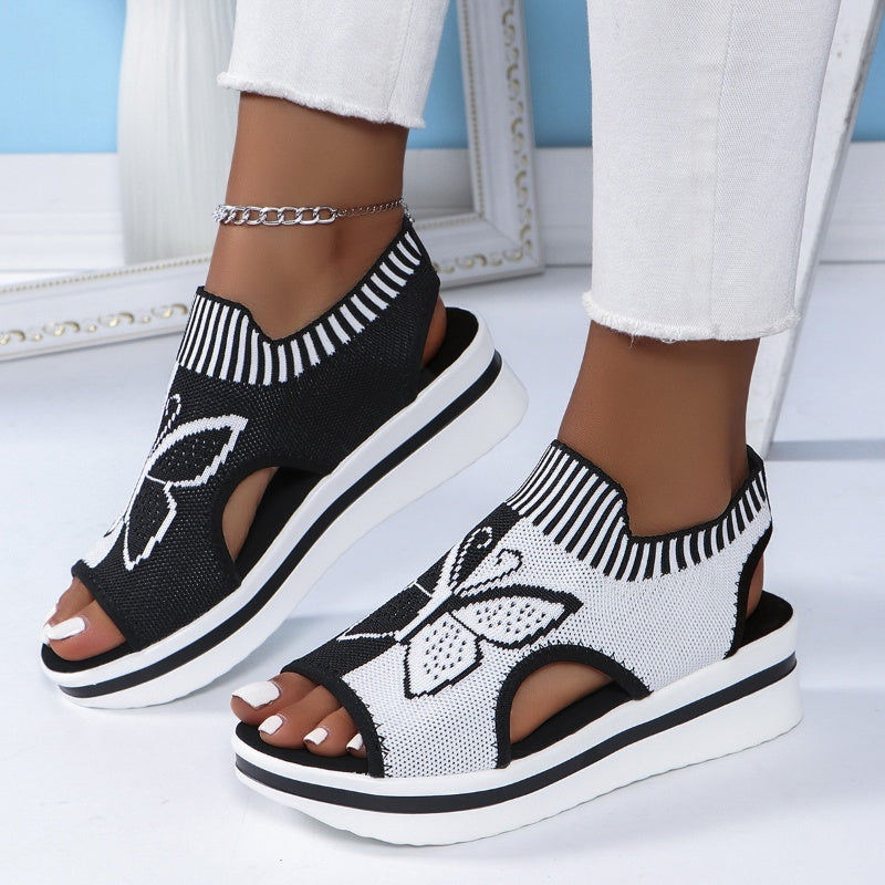 A pair of Arenzza women's casual peep-toe platform beach sandals with open toes and chunky soles, perfect for summer outings.