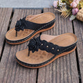 A pair of Arenzza women's floral thong sandals with arch support, lightweight and stylish for comfortable summer wear.