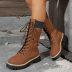 Women's Arenzza quilted mid-calf winter boots with side zipper, showcasing a cozy, insulated design for cold weather.