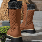 Women's quilted mid-calf winter boots with side zipper by Arenzza, featuring a cozy padded design and sturdy soles.