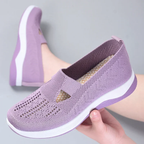A pair of Arenzza women's orthopedic walking shoes featuring breathable fabric and non-slip soles for middle-aged and elderly women.