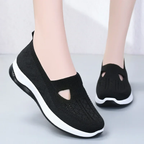 Comfortable Arenzza women's orthopedic walking shoes with breathable fabric and non-slip sole for middle-aged and elderly women.