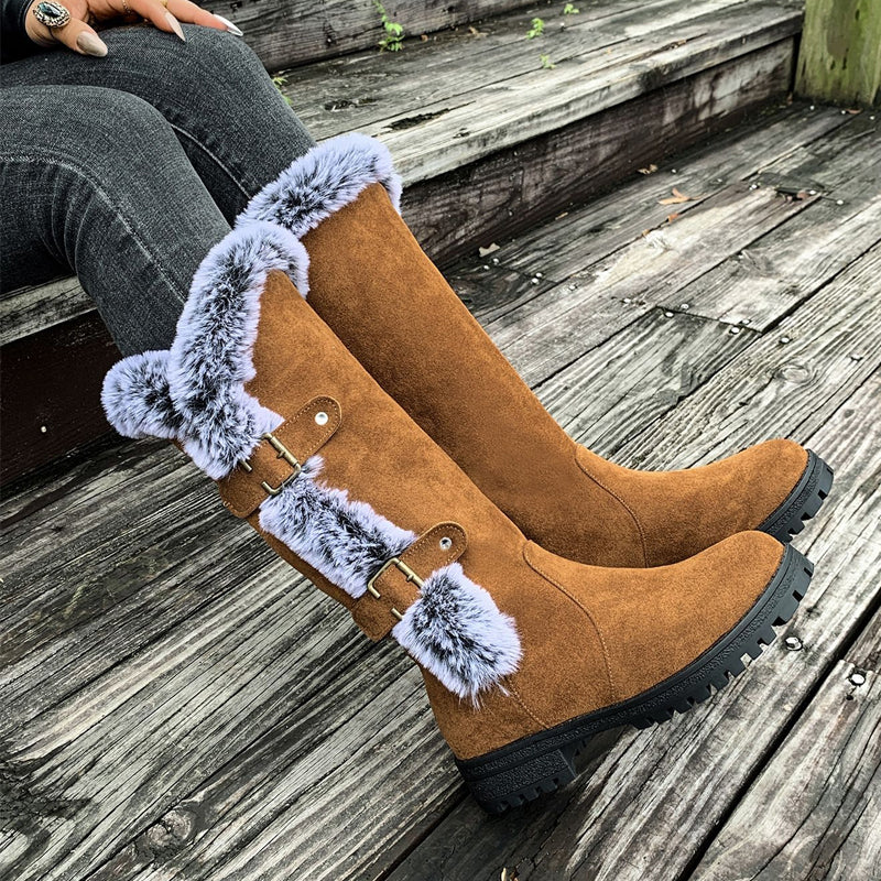A pair of women's thick plush mid-calf snow boots by Arenzza with cozy fur lining and sturdy soles for winter warmth.
