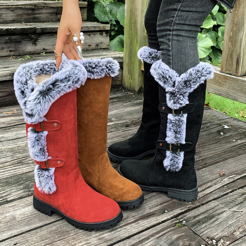 A pair of women's thick plush mid-calf snow boots by Arenzza with cozy fur lining and durable winter sole, perfect for cold weather.