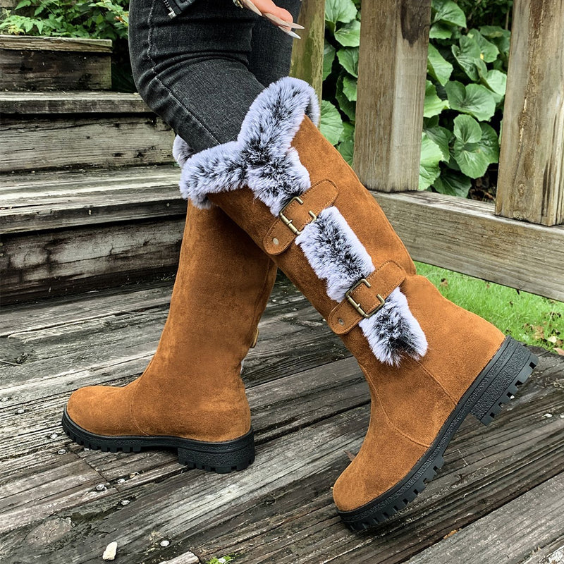 A pair of Arenzza women's thick plush mid-calf snow boots with cozy fur lining and sturdy soles for winter wear.