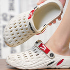 Men’s casual lightweight slip-on clog by Arenzza, showing a comfortable, beige fabric footwear with a slip-on design and casual style.