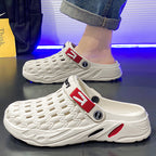 A men's casual lightweight slip-on clog by Arenzza, showing a tan, breathable, easy-to-wear footwear with a comfortable design.