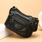Arenzza women's soft PU leather crossbody bag with multiple pockets, stylish accessory for everyday use, shown in the image.