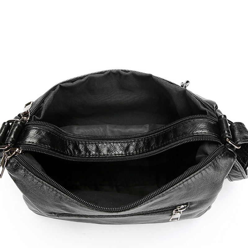 Arenzza women's soft PU leather crossbody bag with multiple pockets, featuring a sleek design and adjustable strap.
