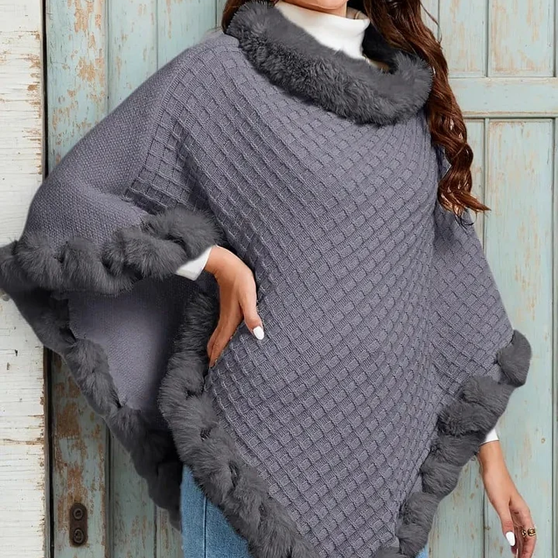 A women's chic ultra-warm knit shawl with faux fur trim from Arenzza, featuring a cozy, stylish design in neutral tones.