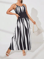 Aarenza LUNE printed maxi cami dress with floral pattern, lightweight fabric, and spaghetti straps, perfect for summer wear.
