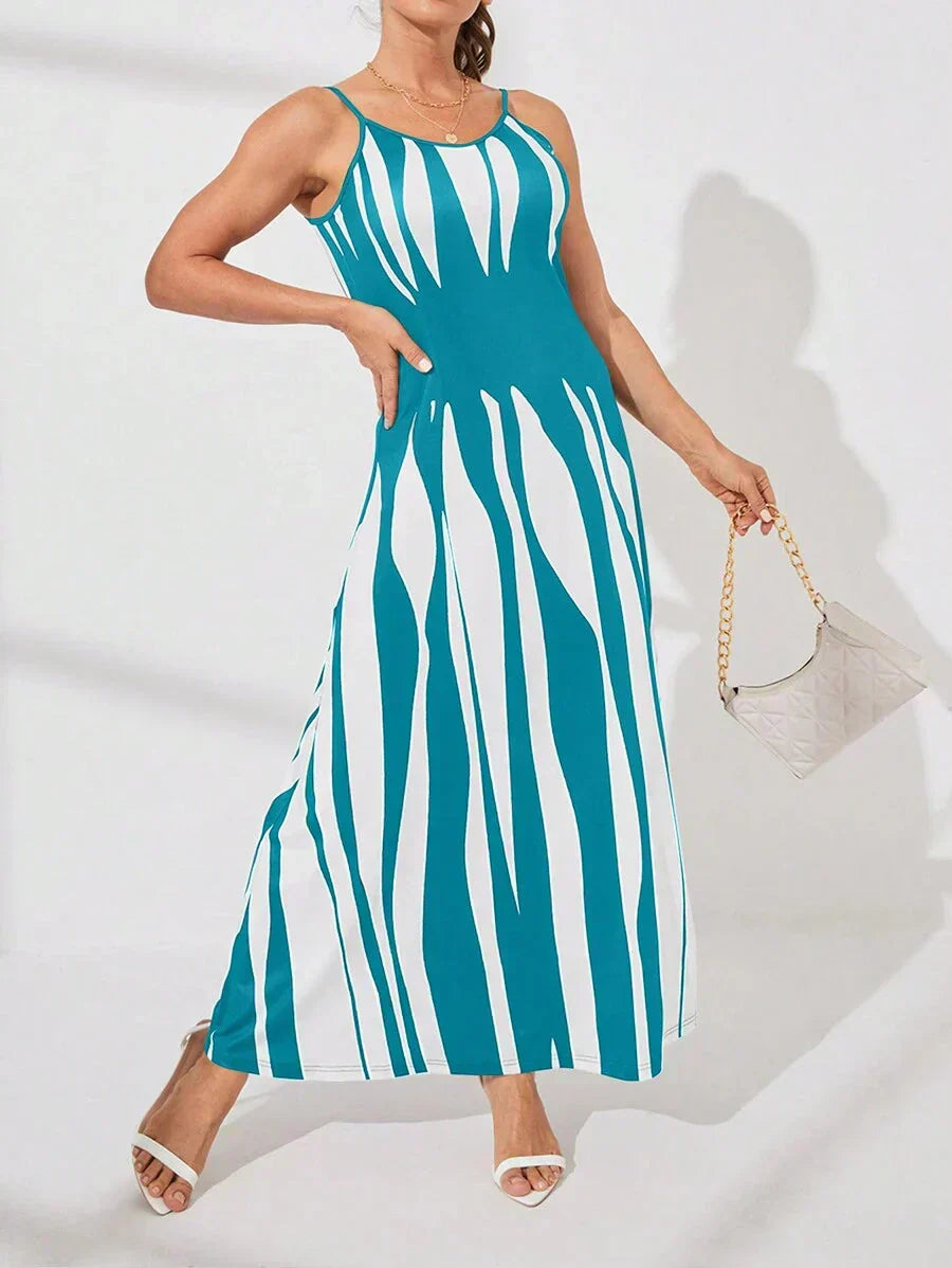 Aarenza LUNE Printed Maxi Cami Dress featuring vibrant floral patterns and a flowing silhouette, perfect for warm weather.