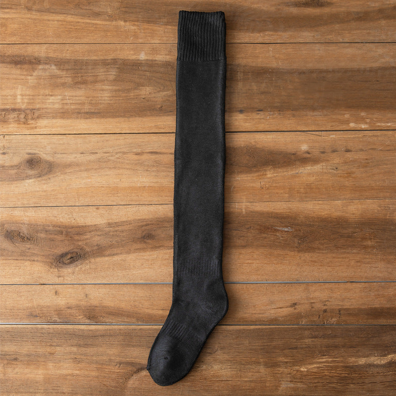 A pair of Warm Thigh High Socks by Arenzza, long cozy stockings made of soft fabric, shown laid flat on a neutral background.