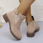 Women's solid elastic low heel ankle boots by Arenzza with sleek design and comfortable fit, featuring black leather and low heel.