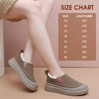 A pair of women's plush cozy warm slip-on shoes from Arenzza, featuring soft fabric and comfortable design for cold weather.
