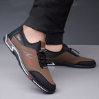A pair of men's slip-on shoes by Arenzza, lightweight and breathable, shown in a natural pose on a plain background.