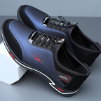 A pair of men's slip-on shoes by Arenzza, lightweight and breathable, shown in a casual footwear style.