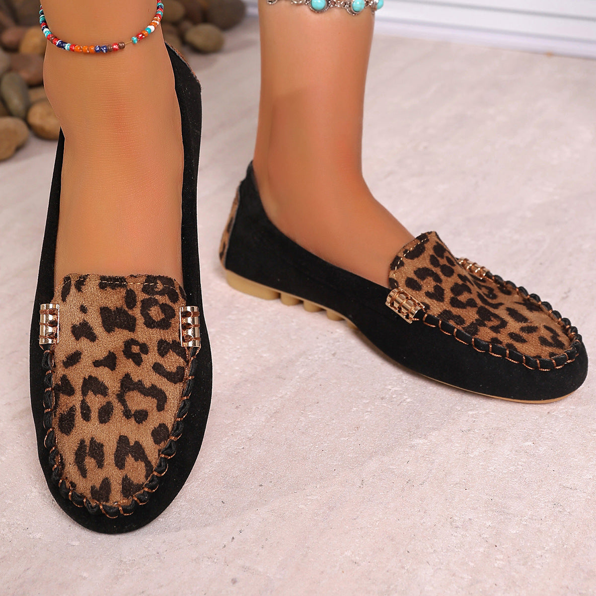 Women's leopard print patchwork loafers by Arenzza, showcasing stylish animal print and comfortable slip-on design.