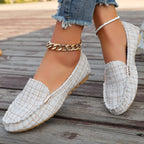 Women's leopard print patchwork loafers by Arenzza, showcasing stylish slip-on shoes with bold animal print and patchwork design.