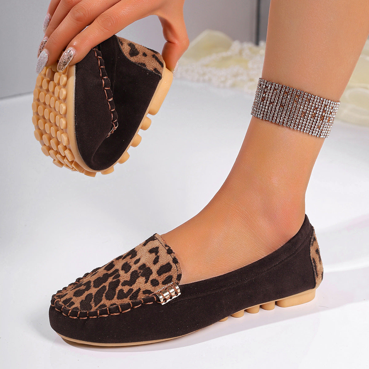 Women's Leopard Print Patchwork Loafers by Arenzza, stylish slip-on shoes with a bold animal print and patchwork design.