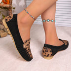 A pair of Arenzza women's leopard print patchwork loafers with a stylish, casual design on a neutral background.