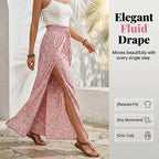 A pair of Arenzza women's smocked waist wide-leg pants with side slit, made from flowy fabric in a relaxed fit.