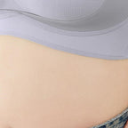 Women's supportive seamless wireless plus-size bra by Arenzza, featuring smooth fabric and comfortable fit in a neutral color.