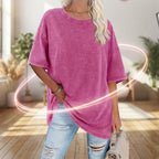 Women’s washed vintage oversized T-shirt by Arenzza, featuring a relaxed fit and distressed fabric, displayed on a hanger.