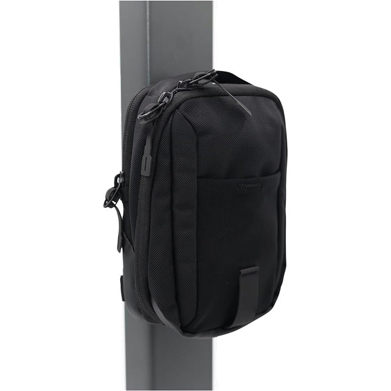Aarenza waterproof magnetic versatile durable bag for clothing and accessories, shown in black with magnetic closures.