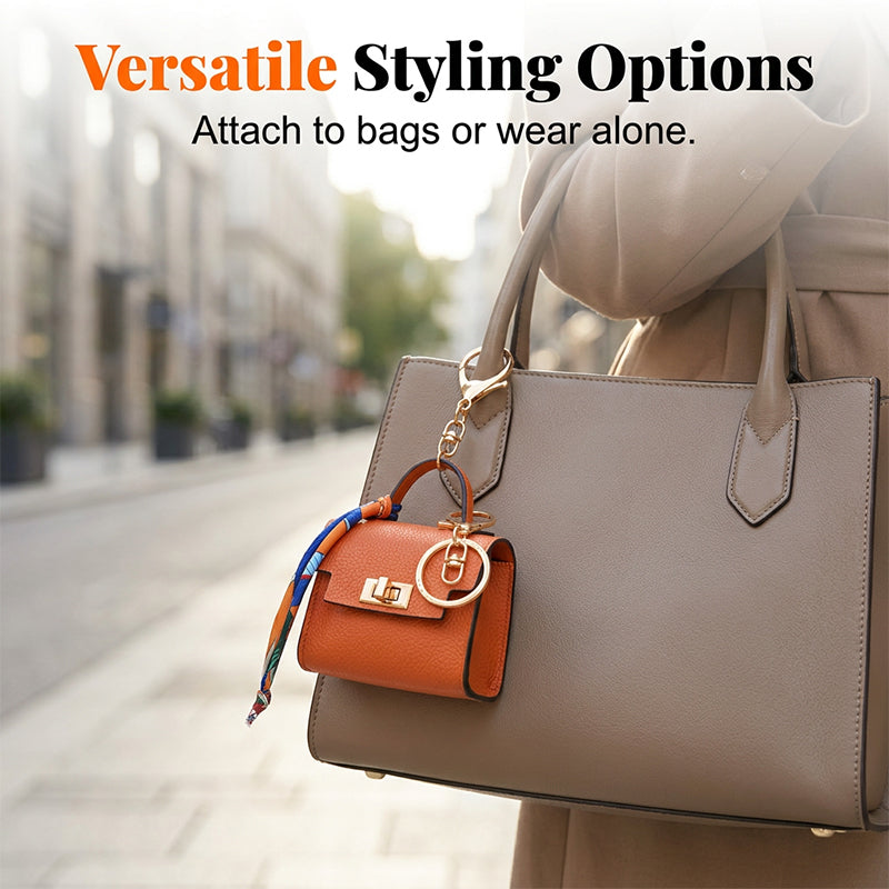 Arenzza mini keychain coin purse in vibrant color, with a compact design and metal keyring attachment for easy carrying.