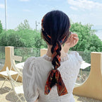Aarenzza Pretty Everyday Wrap Headband with comb teeth, soft fabric accessory with a stylish wrap design and hair grip features.
