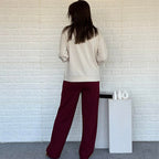 Aarenza women's casual color block two-piece set featuring a long-sleeve top and matching pants in vibrant color blocks.