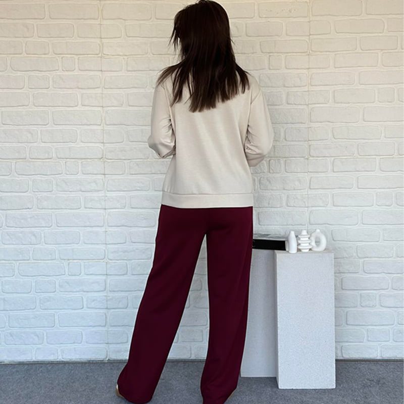 Aarenza women's casual color block two-piece set featuring a long-sleeve top and matching pants in vibrant color blocks.