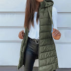 A women’s zip-up long puffer vest by Arenzza, featuring a stylish quilted design and front pockets, perfect for cold weather.