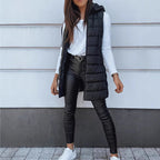 Aarenza women's zip-up long puffer vest in black, stylish insulated outerwear designed for warmth and fashion.