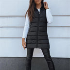 Aarenza women's zip-up long puffer vest in black, featuring a high collar and quilted design, suitable for winter wear.