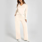 A woman wearing a soft, breathable Arenzza women's casual sweatsuit set, relaxed fit, perfect for lounge or sport activities.