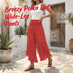 A woman wearing Arenzza high waist wide-leg flowy pants, showcasing their slimming, comfy, chic fit in a stylish outfit.