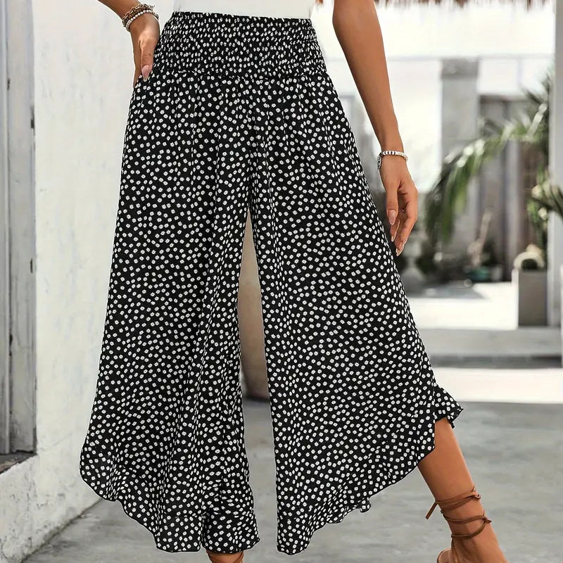A woman wearing Arenzza high waist wide-leg pants showcasing their flowy, comfortable, and chic design in a stylish outfit.