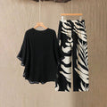 Arenzza women's elegant flowy top and printed pants set, stylish clothing with a relaxed fit and vibrant pattern, ideal for casual wear.