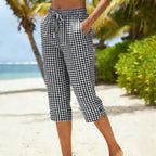 A pair of women's summer plaid Capri pants by Arenzza, featuring a casual fit and vibrant plaid pattern for warm weather outfits.