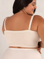 Aarenzza convertible strapless bandeau bra with wireless design, anti-slip grip, and removable straps, shown in white fabric.