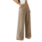A woman wearing lightweight cotton-linen palazzo pants from Arenzza, summer fashion, in a relaxed, flowing fit.