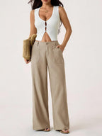 A pair of lightweight cotton-linen palazzo pants for women in a summer-inspired design, from Arenzza, displayed on a model.