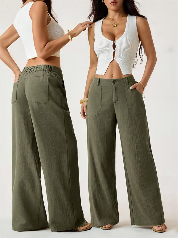 A woman wearing lightweight cotton-linen palazzo pants from Arenzza, summer classical style, in a relaxed, breezy fit.