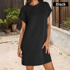 A woman wearing a relaxed Arenzza women's pocket dress, showcasing the casual fit and front pockets, perfect for everyday wear.